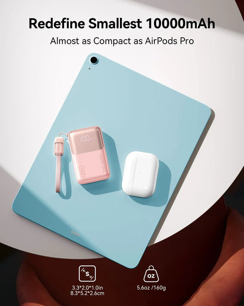 Ultra Mini 10000mAh USB C Power Bank With 45W Fast Charge next to AirPods Pro on a table