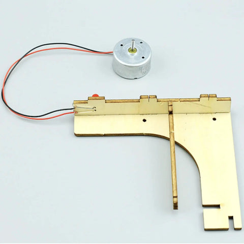 Hands-On Hand Crank Generator Kit For DIY Science Project With Light Bulb, Kid-Friendly Educational Physics And Electromagnetism STEM Kit For Students, Two Piece Set In Random Colors, motor and wooden base view