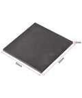 Graphite Plate 50mm x 50mm x 2mm Block For Experimental Electrolysis And Electroplating, smooth surface, shown at angle.
