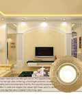 Sleek Four Inch Led Recessed Downlight With Dimmable Spotlight And Flip Switch Tunable Brass Housing ceiling fixture in warm living room.