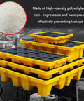 Stacked yellow modular spill containment pallets with drain and anti-leak trays made of heavy duty polyethylene for liquid storage.