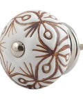 100 Pack Floral Brown Ceramic Drawer Knobs With Slick Rounded Corners And Heavy Duty Hardware For Zero Fuss Installation On Kitchen Cabinets Or Quick Furniture Refresh Projects - Floral design brown ceramic knob close-up.