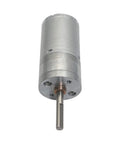 Heavy Duty 6V To 24V DC Gear Motor Pumping Out Dead Legit High Torque At 280 RPM, silver metal body with output shaft for DIY builds.