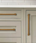 Antique Brass Cabinet Pulls 2 Pack With Three And One Quarter Inch Hole Center 82mm installed on kitchen drawers and cabinet door