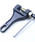 Heavy Duty Chain Breaker Tool For Motorcycle ATV Dirt Pit Bike Go Kart Scooter And Bicycle Chains 420 428 520 525 528 530 Ideal For DIYers And Quick On The Fly Chain Breaks made of heavy-duty iron, showing angled view