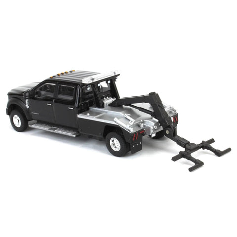 One Sixty Fourth Scale Diecast Ford F 450 Super Duty Dually With Wrecker Bed Black Exclusive Model Truck rear view