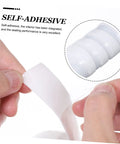 Two-Pack Flexible Seal Tape For Plumbing Repairs, Self-Adhesive Rubberized Silicone Sealant Tape being peeled off for application