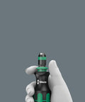 Hand holding K Kraftform 817 R SB Hex Bit Holder Screwdriver With Rapidator Quick Release Chuck Bayonet Blade tool.