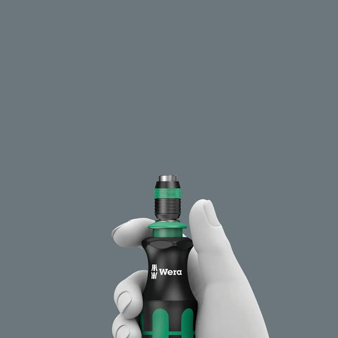 Hand holding K Kraftform 817 R SB Hex Bit Holder Screwdriver With Rapidator Quick Release Chuck Bayonet Blade tool.