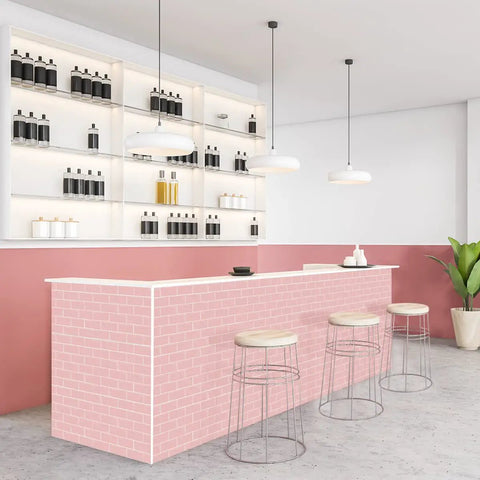 Pink subway tile peel and stick backsplash installed on bar counter in modern kitchen, showcasing 12x12 tiles for easy makeover.