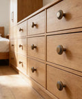Retro Brass Cabinet Hardware Set With Greek Key Knobs And Hammered Texture on wood drawers
