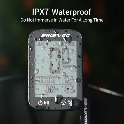 Close-up of IPX7 waterproof GPS Bike Computer with Auto Backlight for Road and Mountain Riding, wet with water droplets.