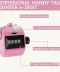 Dang Solid Four Digit Mechanical Tally Clicker Counter In Bright Pink With Two Heavy Duty Nylon Lanyards For Tracking Sports Drills Knitting Stitches Golf Rounds And Fishing Lines Pure Manual Gear No Batteries Or Recharging Cables Needed Ever showing a 4-digit counter with click button and reset knob.