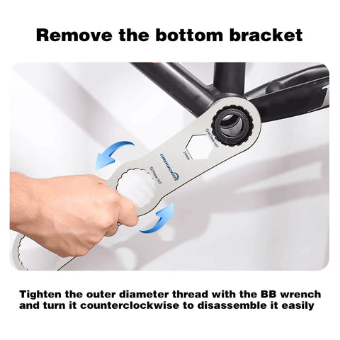 Hand using Multi Function Bottom Bracket Wrench Pro Grade Tool For 39 40 Point 5 44mm Outer Diameter 16 Notch Fits Shimano BB Series And SRAM GXP Bikes on bike frame.
