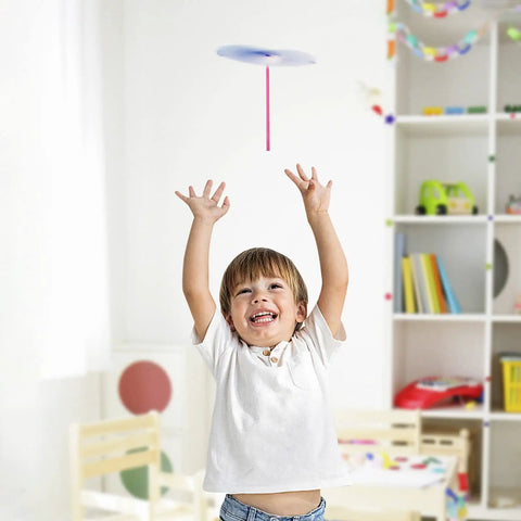 Child playing with Hand Helicopter Set For Kids Ages 8 To 12 With 200 Pieces 100 Propellers And 100 Rods Bamboo Dragonfly Aero Props