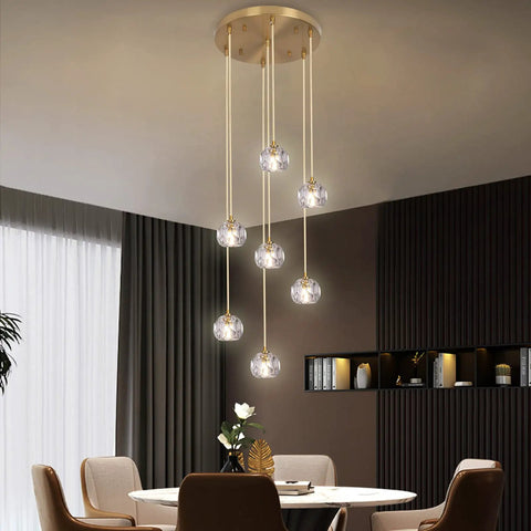 Sleek Modern Crystal Pendant Light With Seven LED Crystals, Adjustable Brass Plating Frame, K9 Crystal Ball Chandeliers in dining room