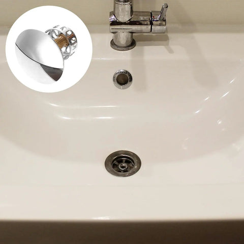 Copper Bathtub Drain Stopper, Slotted Push Button Waste Plug in a white bathtub with chrome faucet.