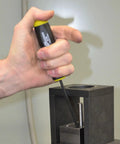 Hand using Set Of 13 Workhorse Balldriver Screwdrivers With ProGuard Finish on metal part, ergonomic cushioned handle visible