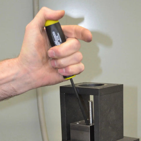 Hand using Set Of 13 Workhorse Balldriver Screwdrivers With ProGuard Finish on metal part, ergonomic cushioned handle visible
