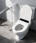 Heavy Duty Flip Up Toilet Grab Bar With Adjustable Length And Height Hella Stable Bathroom Safety Rail For Seniors Support Leg 660 Lb Capacity Anti Slip Handicap Handrail Built Like A Tank Grip mounted beside a toilet.