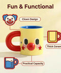 Clown Face Ceramic Mug 10 oz yellow coffee cup with blue interior, red handle, and 3D nose, fun design, durable, dishwasher safe