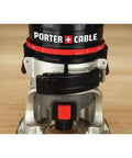 Corded Router With 4.5 Amp Motor And 31,000 RPM, Quarter Inch Laminate Trim, Quick Release Clips, close-up on base and logo