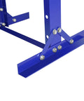 Close-up of blue H-frame base of Heavy Duty 12 Ton Hydraulic Shop Press With H Frame Garage Floor Workhorse Adjustable Working Table Height Thick Steel Plates Powder Coated Durable Carbon Steel Construction Perfect For Auto Body Metalworking And Home Shops
