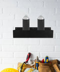 Wall Mount Spray Can Holder And Tool Rack Heavy Duty Metal Storage Shelf for aerosol cans on white brick wall