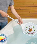 Person using 2 Foot Hand Skimmer Net For Hot Tubs And Above Ground Pools Made In USA Durable Plastic Pool Cleaning Tool to collect leaves from water.