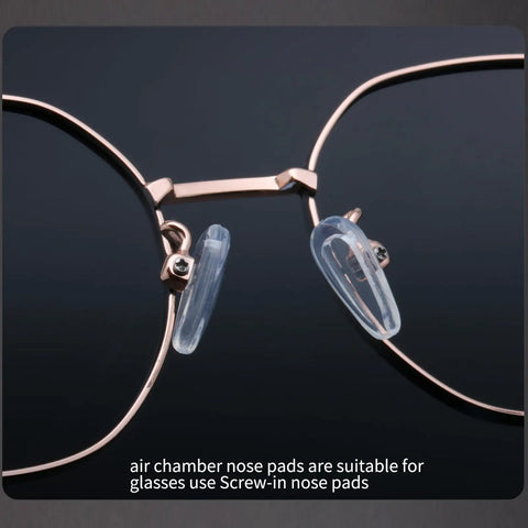 Close-up of Super Comfy Air Chamber Nose Pads For Glasses with transparent silicone pads attached to frames.