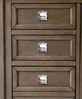 Close-up of drawer with Two Pack One And A Quarter Inch Backplates For Cabinet Knobs In Polished Chrome Drawer Hardware With Vintage Aged Look