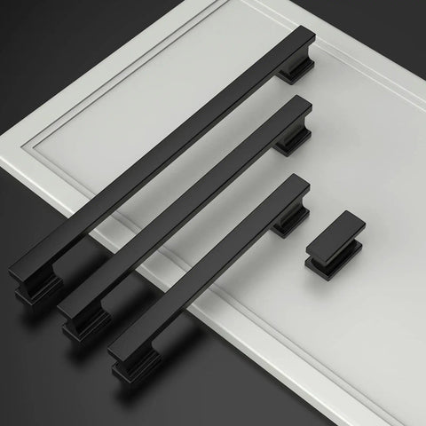 Set of Matte Black Cabinet Pulls 6 Pack With 7 Inch Hole Centers displayed on a white cabinet surface for kitchen and cupboard use