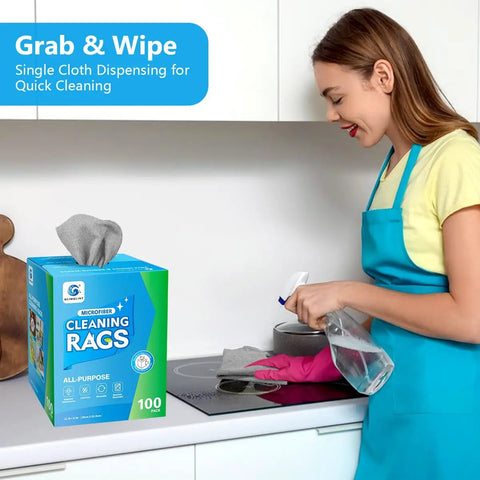 Woman using 100 Pack Microfiber Cleaning Cloths Dispenser Box Lint Free Ultra Absorbent Reusable Rags in kitchen for cleaning.