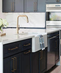 Kitchen with dark cabinets featuring Six Pack Cabinet Pulls Center To Center Seven And Nine Sixteenths Inch Warm Champagne Bronze