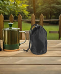 Two Pack Waterproof Rain Gear Storage Bags With Drawstring Pouches For Quick Access Rain Poncho Organizer in outdoor setting.