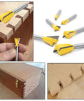 Premier Heavy Duty Dovetail Router Bit Set Six Piece Collection With One Quarter Inch Shank equipped with carbide blades in use.