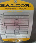 Label on heavy duty 3HP electric motor 1750 RPM 215 frame industrial grade for high torque machinery