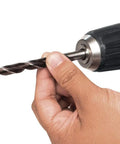 Killer Cordless Driver Drill Packing 12 Volt Max Brushless Power With Precision Chuck And Featherlight Frame For Snug Workspaces And Serious Grinds Daily, showing a hand holding a drill bit.