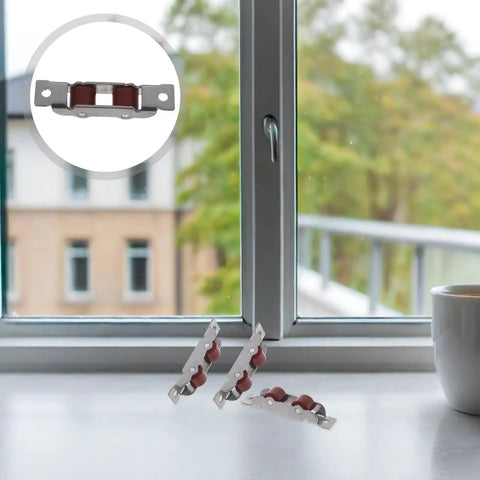 Premium Stainless Steel Sliding Window Rollers And Door Pulleys Featuring Double Wheel Bearings For Hella Smooth Gliding and No Sweat Heavy Duty Hardware Replacement 4 Pack beside a window.
