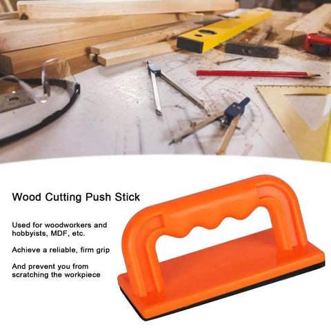 Safety Orange Oblique Push Block For Table Saws And Router Tables Featuring Steady Grip And Non Slip Base on woodwork desk.