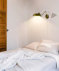 Plug In Wall Sconce Set Of 2 With Adjustable Swing Arm In Gold Brass Finish Easy On Off Switch 2 In 1 Design in cozy bedroom
