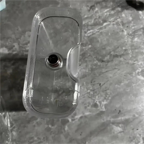 Top view of transparent Easy Install Water Tank And Cover Accessory For Capsule Coffee Machines Replacement Tank Kit Fits EN650 F531 Models Durable Build With Snap In Fit Keeps Your Coffee Maker Ready For Quick Brew showing opening and connector.