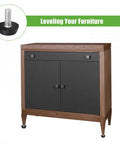 Heavy Duty 12 Pack Adjustable Furniture Levelers With M6 Thread Anti Wobble Feet stabilizing a sleek black and wood sideboard.