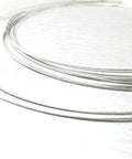 Silver solder wire coils on a white surface, No Hassle Pro Grade Easy Flow Silver Solder Wire For Jewelry Making And Repair, Extra Soft