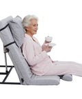 Sturdy Greenlemon Electric Bed Backrest Lifter With Remote Adjustable Support For Heavy Duty Use Up To 300 Pounds Load Capacity Flexible Angle Settings From Four To Sixty Eight Degrees, showing senior woman relaxing with a cup and plate.