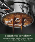 Professional Grade Home Espresso Maker Featuring Solid Twenty Bar Pressure And A Stainless Steel Bottomless Portafilter extracting espresso.