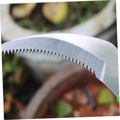 Close-up of the serrated blade on the Portable Scythe Grass Cutter For Harvesting And Weeding Lightweight Farm Safety Tool