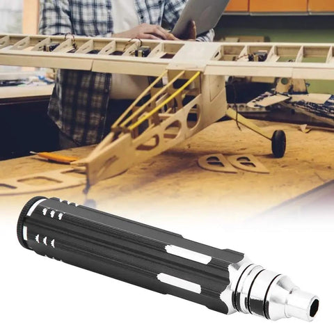 4 in 1 RC Aircraft and Drone Screwdriver Kit for Hex Screws, Disassembly Tool and DIY Maintenance with DIY plane in background