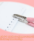 Five Piece Handheld Paper Punch Set With Plastic Handle, Metal Tag Punches for DIY Craft Tags demonstrating use on A4 paper