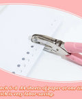 Three Piece Metal Handheld Paper Punch Set With Plastic Handle punching holes in paper